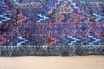 turkmenský koberec - stav po restaurování podélného okraje